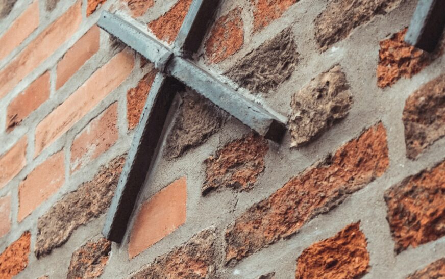 How to Hang Items on Brick Walls Without Turning Them Into Rubble
